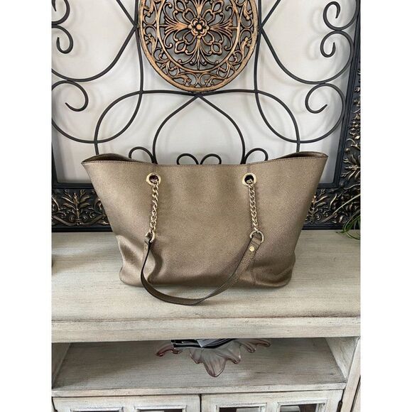 Calvin Klein Handbags - Calvin Klein Gold Metallic Tote